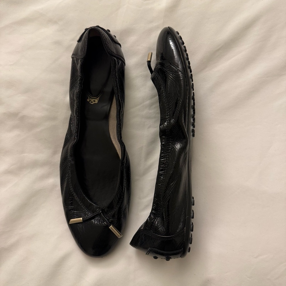 Tod's Black Leather Ballet Flats with Metal Accents